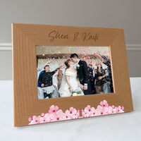 Load image into Gallery viewer, Couples wedding picture frame, Family name gift, Gift for newlyweds, Cherry Blossom design / 4x6 photo frame / Printed &amp; Laser Engraved
